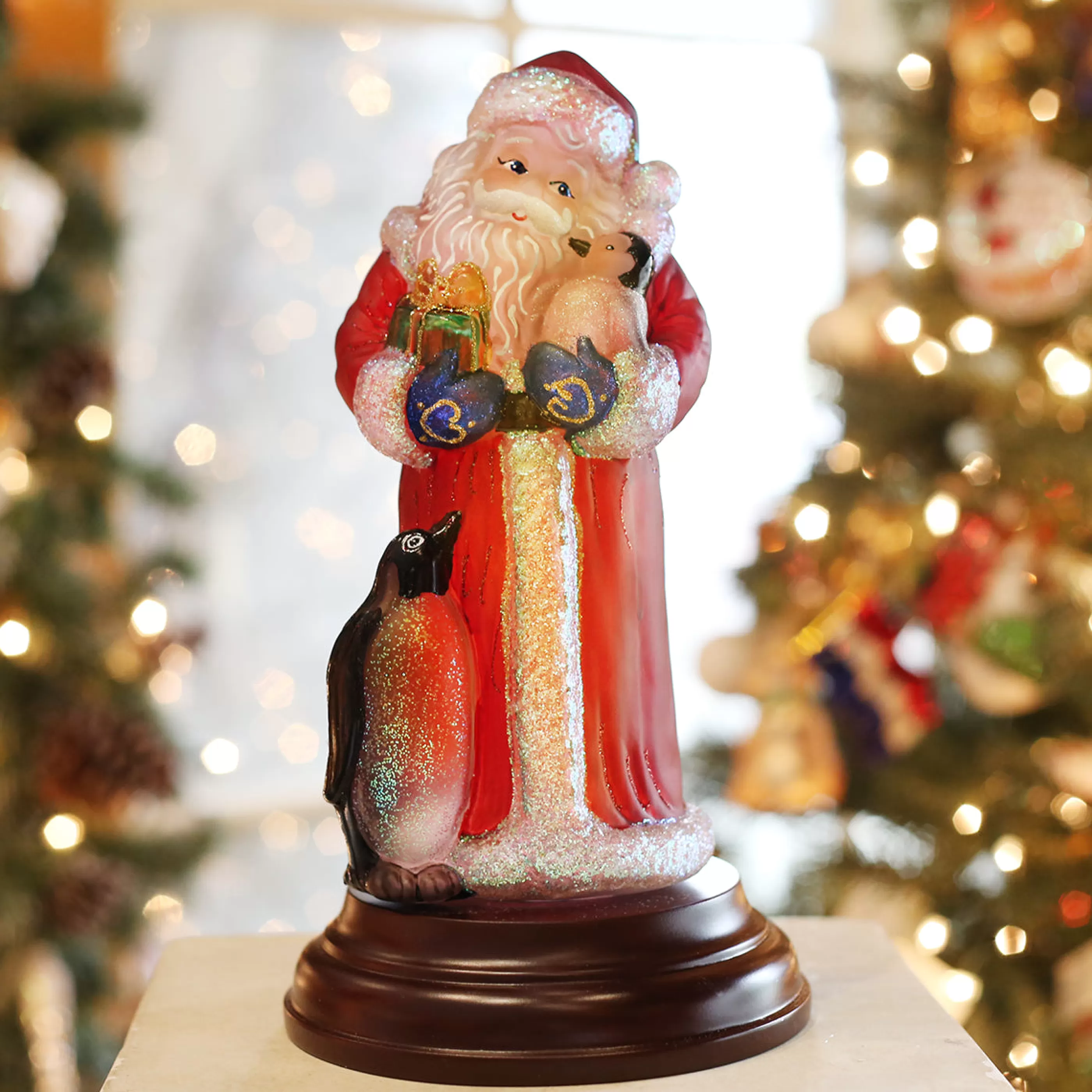 Guining Santa With Penguin Pals