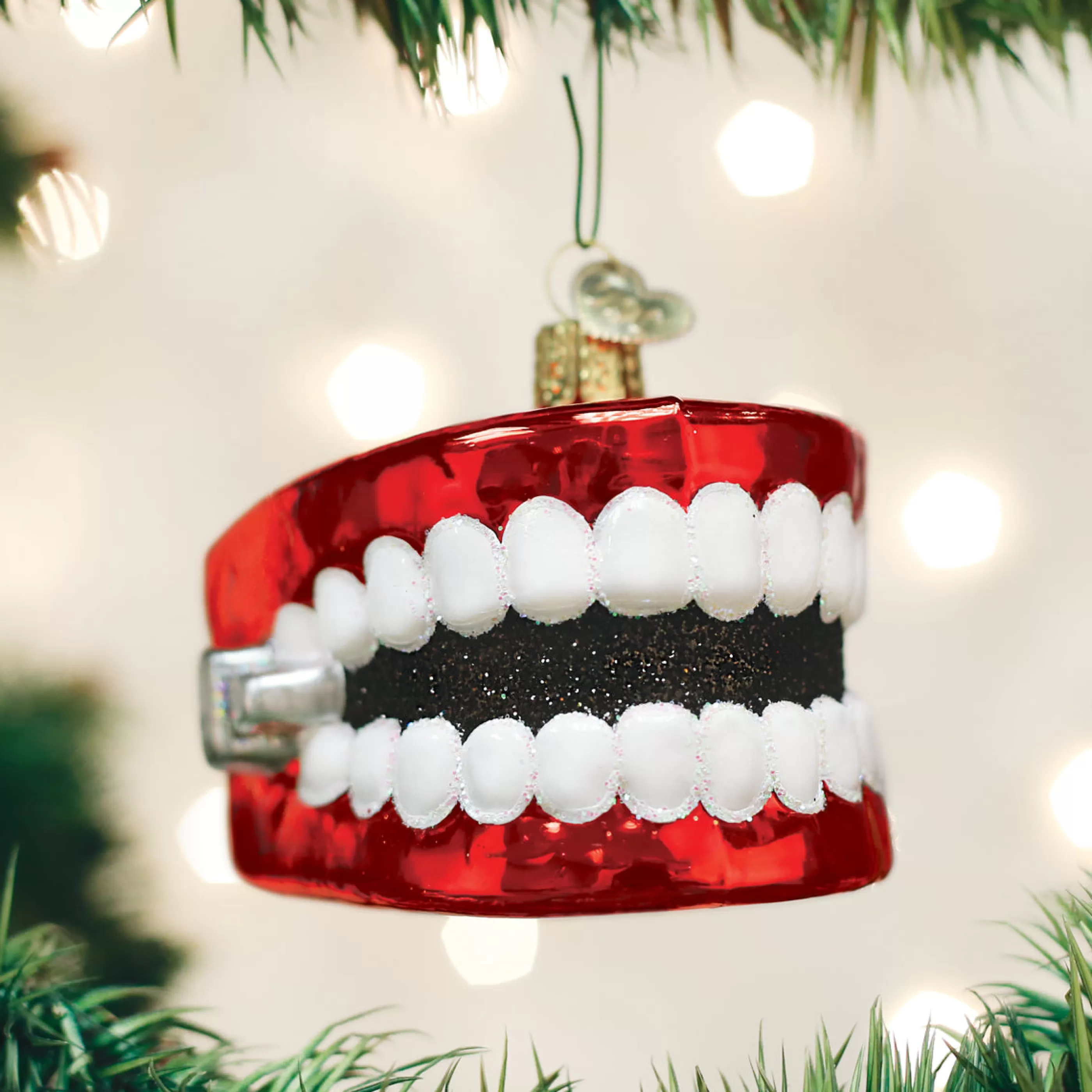 EAST WEST Wind Up Teeth Ornament